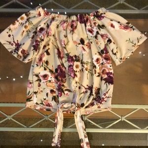 Floral top. Off the shoulder option.